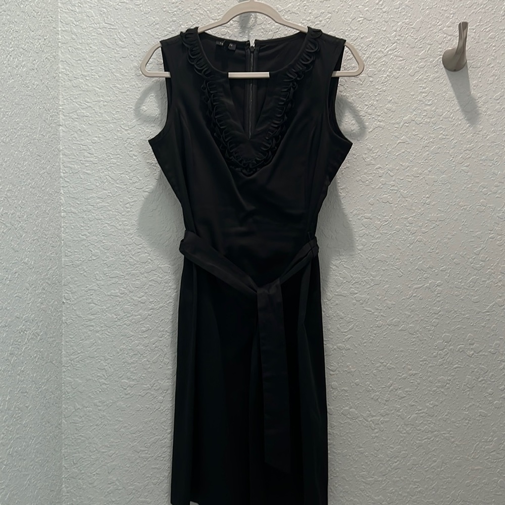 Blank sleeveless dress with tie belt.  Great summer dress